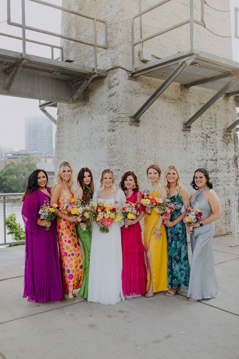 Unique Colorful Mismatched Bridesmaid Dresses for Spring Wedding with Vibrant Floral Bouquets Summer Boho Bridesmaid Dresses, Bright Jewel Tone Bridesmaid Dresses, Colourful Mismatched Bridesmaids, Mixed Color Bridesmaid Dresses Summer, Unique Bridesmaid Dresses Boho, Bold Colorful Wedding, Bright Summer Bridesmaid Dresses, Different Colour Bridesmaids, Bridesmaids With Different Color Dresses