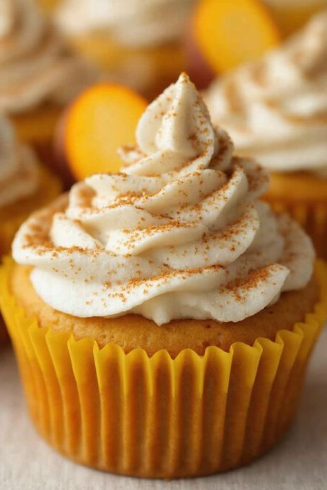 Pumpkin Cheesecake Cupcake Recipe  Ingredients  - 1 1/2 cups graham cracker crumbs - 1/4 cup sugar - 1/2 cup unsalted butter, melted - 1 (8 oz) package cream cheese, softened - 1/2 cup sugar - 1 cup canned pumpkin puree - 2 large eggs - 1 teaspoon vanilla extract - 1 teaspoon pumpkin pie spice  Instructions  - Preheat the oven to 325°F and line a muffin tin with cupcake liners.  - In a medium bowl, combine graham cracker crumbs, 1/4 cup sugar, and melted butter; press mixture into the bottom of each cupcake liner.  - Read more on... Pumpkin Cheesecake Cupcakes Recipe, Vanilla Halloween Cupcakes, Pumpkin Roll Cupcakes, Little Pumpkin Baby Shower Cupcakes, Pumpkin Cream Cheese Cupcakes, Cornbread Cupcakes, Pumpkin Pie Cupcakes Recipe, Pumpkin Cheesecake Cupcakes, Cheesecake Cupcake