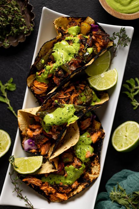 Jerk Salmon Tacos + Avocado Cilantro Lime Sauce | Simple Healthy Recipes, Complex Flavors | Orchids + Sweet Tea Jamaican Jerk Salmon, Jerk Fish Tacos, Jerk Salmon Tacos, Jamaican Tacos, Jerk Salmon Recipe, Jerk Shrimp Tacos, Mexican Salmon, Blackened Salmon Tacos, Salmon Fish Tacos