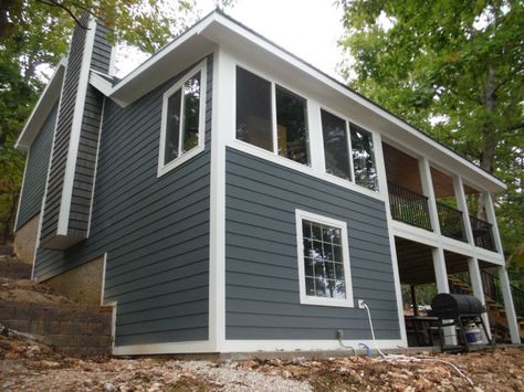 Back of house with new James Hardie Evening Blue Siding and Arctic White soffit, fascia, and trim. James Hardie Evening Blue, Hardie Board Siding Colors, Blue Vinyl Siding, Hardy Board, Modern Siding, Hardy Plank Siding, Blue Houses, Blue Siding, Hardie Board