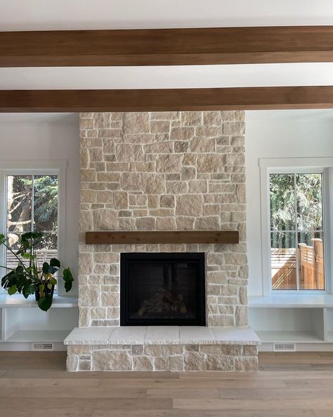 Creamy, beige, sandy stone fireplace in a living room using Casa Blanca RoughCut from Eldorado Stone available at I-XL Building Products. Rockwall With Fireplace, Stone Chimney Interior, Stone Fireplace With Mantle And Tv, Stone Farmhouse Fireplace, Stone Fireplace In Bedroom, Stone Tiled Fireplace, How To Build A Stone Fireplace, Casa Blanca Stone Fireplace, Full Wall Stone Fireplace