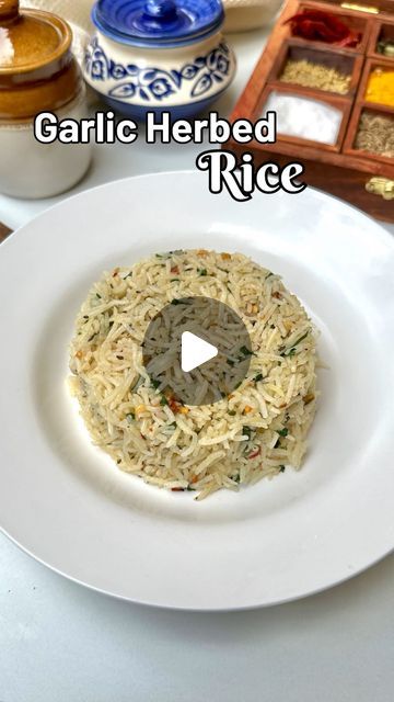 Megha Mahindroo | Recipe Video Creator on Instagram: "Garlic Herbed Rice is a perfect way to use left over cooked rice and elevate the taste of your meal✨❤️  Here is what all you need:   Cooked rice  Finally, chopped garlic  Chilli flakes  Oregano  Black pepper  Salt  Coriander leaves  Butter   (Recipe, herbed rice, fried rice, leftover rice recipe, easy rice recipe, simple use of rice, quick recipe)   #recipe #rice #herbedrice #garlicrice #explore #butter #herb #mixedherbs #reelitfeelit #explorepage #ricerecipe" Herb Rice Recipes Simple, Herb Rice Recipes, Garlic Rice Recipes, Rice Recipe Easy, Garlic Butter Rice, Herb Rice, Herbed Rice, Leftover Rice Recipes, Butter Herb