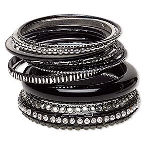 Ready-to-wear bangle bracelets in chic black and silver are accented with shimmering rhinestones and glitter. Delivering just-for-fun style, these eye-catching bracelets add right-on-time style to wrists and counter displays. Ideal for gift giving or extending current jewelry lines. Black With Glitter, Emo Accessories, Jewelry Lifestyle, Jeweled Shoes, Goth Jewelry, Magazine Ad, Funky Jewelry, Emo Fashion, Fun Style