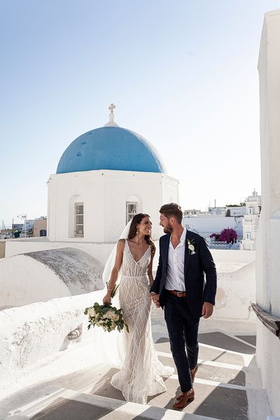 married couple walking through streets of santorini Blanche Bridal, Santorini Wedding Venue, Greek Islands Wedding, Santorini Photographer, Calla Blanche, Wedding Gowns Online, Santorini Wedding, Greece Wedding, Unique Wedding Venues