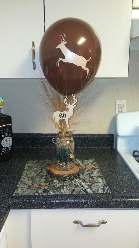 Hunting 50th Birthday Party, Hunting Theme Table Decorations, Hunting Party Centerpieces, Camo Centerpiece Ideas, Camo Graduation Party Ideas, Hunting Theme Party For Men, Hunting Centerpiece Ideas, Hunting Centerpieces, Hunting Birthday Party Favors