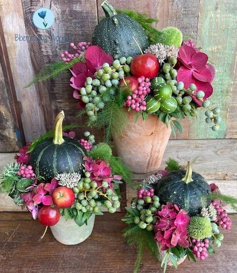 DIY Pumpkin Flower Arrangements: A Festive and Fun Way to Celebrate Fall Pumpkin Flower Arrangements, Pumpkin Flower Arrangement, Pumpkin With Flowers, Harvest Festival Decorations, Pumpkin Floral Arrangements, Creative Diy Projects, Fake Pumpkins, Fall Flower Arrangements, Diy Arrangements