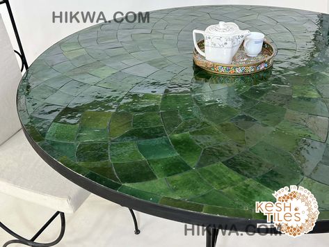 AMAZING MOSAIC TABLE, Handmade Round Green Table, Traditional Custom Made Flower Design,  Luxurious Outdoor Patio Furniture For Home Decor Check more at https://hikwa.com/product/amazing-mosaic-table-handmade-round-green-table-traditional-custom-made-flower-design-luxurious-outdoor-patio-furniture-for-home-decor/ Mosaic Round Table, Moroccan Fountain, Moroccan Side Table, Mosaic Tile Table, Moroccan Furniture, Mosaic Table Top, Tile Table, Pom Pom Pillows, Jewelry Box Mirror