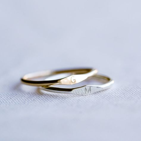 A Dainty Tiny Signet Ring, customised with a letter/initial of your choosing. The perfect ring for stacking! Each letter is hand stamped in our 1.5mm tiny block font (uppercase only). Available in sizes 2 US to 15 US Need help with sizing? Look at our size guide or purchase our ring sizer Due to its handmade nature, there may be some colour variances where the solder seam is Each Stamp + Shine piece is made from scratch in our little studio in Melbourne, Australia. The process begins with a clea Wedding Ring Initial, Dainty Initial Ring, Cute Couple Jewelry, Ring With Initials, Customised Jewellery, Initial Rings, Couples Rings, Couples Jewelry, Clean Metal