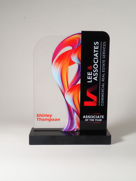 This stunning piece, designed by our talented team member Ray Vibar, showcases a striking blend of clear and black acrylic, illuminated by vibrant color-fused hues. With 15 years of dedication to our company, Ray has crafted an award that embodies both innovation and artistry. Celebrate exceptional achievements with the elegance of the SkyFire Award! Award Design Ideas, Award Plaque Design, Plakat Acrylic, Award Design, Menu Card Design, Acrylic Trophy, Plaque Design, Glass Awards, Office Interior Design Modern