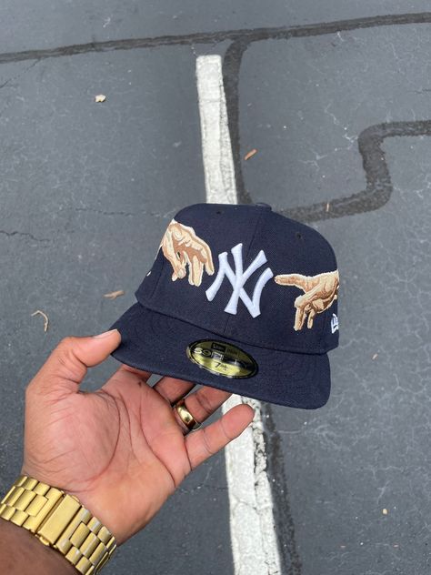 Sistine chapel inspired custom Yankee fitted. Custom embroidery Fitted Hats Custom, Custom Hats For Boyfriend, Custom Yankee Hat, Embroidered Fitted Hat, Fitted Caps Men Outfit, New Era Aesthetic, Bedazzled Hat, Hats Aesthetic, Nyc Cap