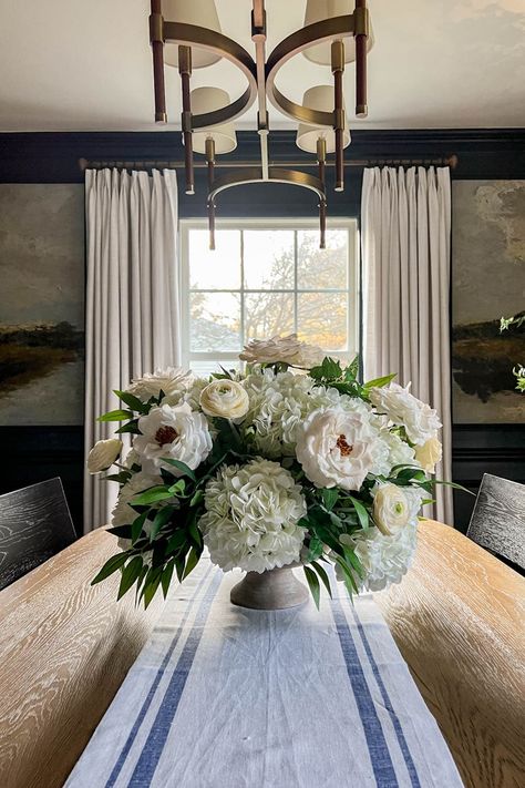 How to make classic DIY flower arrangements for centerpieces in this step-by-step tutorial using realistic faux flowers. Faux Centerpieces Floral Arrangements, Flower For Dining Table, Formal Wedding Centerpieces Diy, Diy Floral Centerpieces Wedding Receptions Silk Flowers, Food Table Flower Arrangements, Flower Dining Table Decor, Floor Flower Arrangements Wedding Diy, Dining Room Table Floral Arrangements, Living Room Floral Arrangements