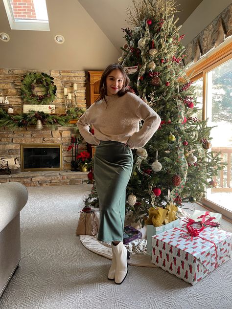 Silk Skirt Sweater Boots Outfit, Silk Skirt Outfit Christmas, Christmas Midi Skirt Outfit, Winter Sweater Skirt Outfit, White Sweater Christmas Outfit, Boots And Midi Skirt Outfit, Sweater And Silk Skirt Outfit, Midi Skirt With Sweater Outfit, Skirt Sweater Boots Outfit