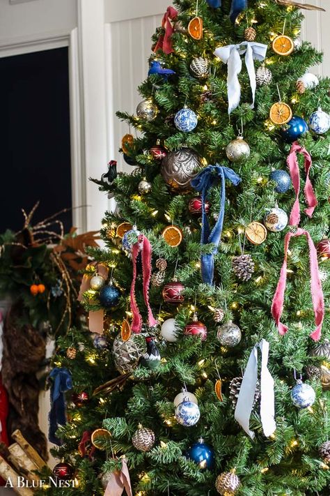 Overdecorated Christmas Tree, Serena And Lily Christmas Tree, Pink Blue And Green Christmas Tree, Old European Christmas Decor, Global Christmas Decor, Orange And Blue Christmas Decor, Little Women Christmas Tree, Christmas Tree With Oranges, Nutcracker Suite Christmas Decorations