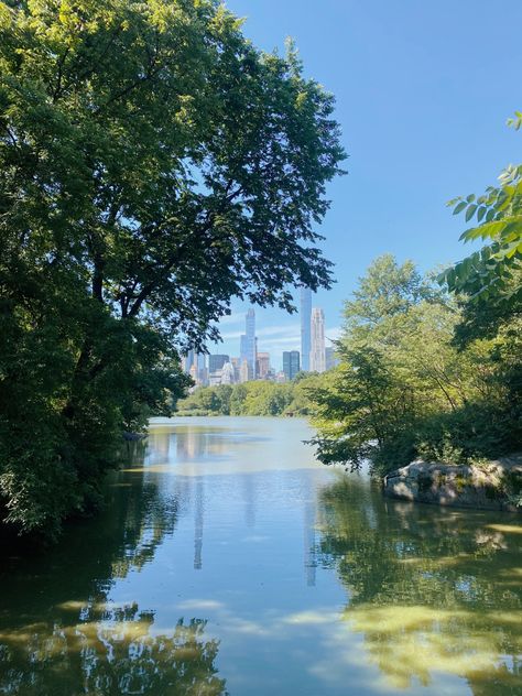 Skyscrapers reflecting on lake, surrounded by trees Future Manifestation, Central Park New York City, New York Central, City Skyline, Lake City, Park City, Central Park, Kayaking, York City