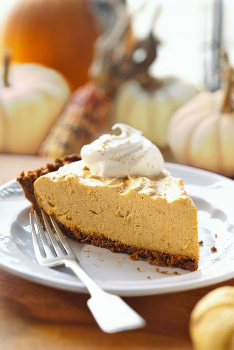 A gingersnap crust adds double the fall flavor to this festive pie recipe. #pumpkinpie #pumpkinpierecipe #pumpkinchiffonpie #thanksgiving #bhg Pumpkin Chiffon, Pumpkin Chiffon Pie, Chiffon Pie, Easy Pumpkin Dessert, Baking Recipes Pie, No Bake Pumpkin Cheesecake, Gingersnap Crust, Pumpkin Mousse, Pumpkin Pie Cheesecake