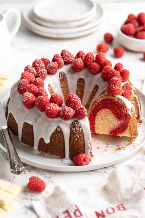 This white chocolate raspberry Bundt cake is gorgeous on the inside and out! The flavors of the raspberry and white chocolate really pop! Bundt Cake Recipes Chocolate, White Chocolate Raspberry Bundt Cake, Chocolate Raspberry Bundt Cake, Raspberry Bundt Cake, Grandbaby Cakes, Bundt Pans, Spring Food, Nothing Bundt Cakes, Chocolate Pound Cake