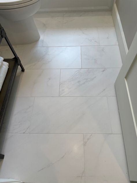 Simple Tiles Design For Floor, Groutless Bathroom Floor, White Bathroom Tiles Floor, White Bathroom Floor Ideas, Light Bathroom Floor Tile, Tile Over Tile Bathroom, White Marble Bathroom Floor, Classic Bathroom Floor Tile, White Bathroom Floor Tile Ideas