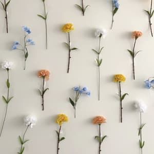 How To Make Your Own DIY Flower Wall Fake Flowers For Wall, Flower Decoration Bedroom, Washi Tape Flower Wall, Tape Flowers To Wall, Floral Background Diy Backdrop Ideas, Photo Flower Wall, Dorm Flower Wall, Taped Flower Wall, Upside Down Flower Wall