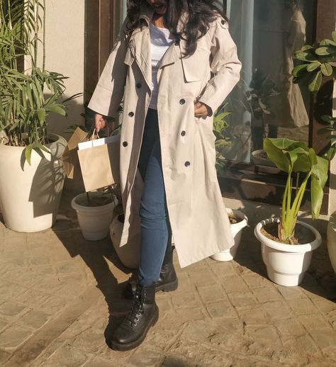 Beige Trench Coat Outfit, Styling trench coat with blue skinny jeans and black boots Winter season is here! For a brunch date I went for a minimalist look. Embracing the sunlight, I styled my Beige Trench coat with white sando innerwear, skinny dark blue jeans, and black boots. A perfect outfit for a cutesy date. Beige Trench Coat Outfit, Styling trench coat with blue skinny jeans and black boots Black Boots Winter Outfit, Styling Trench Coat, Beige Trench Coat Outfit, Trench Coat Outfit Winter, Boots Winter Outfit, White Sando, Combat Boot Outfit, Black Coated Jeans, Winter Coat Outfits