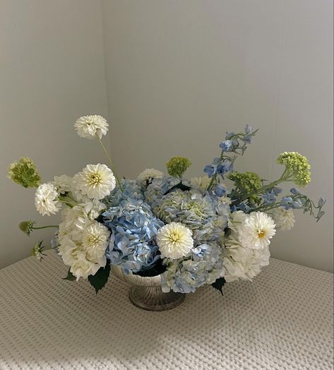 White and blue hydrangea compote with white dahlias Hydrangea White Centerpiece, Blue Hydrangeas Centerpiece, Blue White Centerpieces, Hydrangea And Dahlia Bouquet, Blue And White Arrangements, Blue Baby Shower Flowers, Hydrangea Table Centerpiece, Blue And White Hydrangea Centerpiece, Blue Hydrangea Arrangements