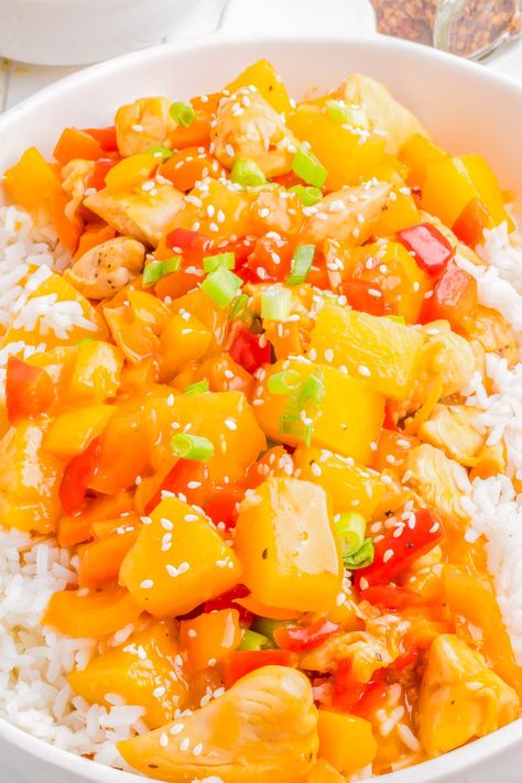 Hawaiian Pineapple Chicken Skillet— 🍗🍍🏝️Tender pieces of chicken are cooked with bell peppers and pineapple chunks, then coated in a SWEET and TANGY sauce! Pineapple chunks and pineapple juice create layers of tropical island flavor! This is a FAST and EASY recipe that’s ready in 30 minutes, made in a single skillet, and perfect for busy weeknights! Hawaiian Pineapple Chicken, Chicken And Pineapple, Stove Top Chicken, Pineapple Rice, Pineapple Chunks, Chicken Skillet, Hawaiian Chicken, Pineapple Recipes, Pineapple Chicken