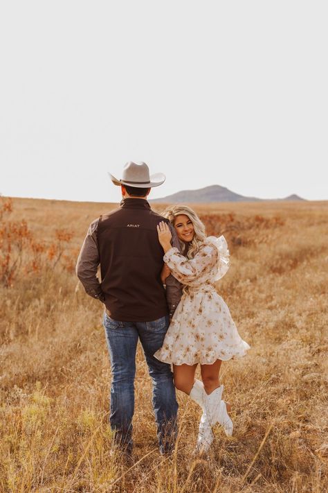 Western Couple Shoot for Engagements | Engagement photo poses | Texas Photographer. Watch as these love birds twirl under the stars, their western outfits adding a touch of cowboy charm to their intimate moments. Discover unique engagement photo shoot ideas, western couple look, modern country engagement photos and spring engagement photos. Book Krista to capture your western Texas engagement session at kristafrancisphotos.com. Cute Couple Western Pictures, Engagement Photos Rustic Ideas, Boho Couple Photoshoot Outfits Fall, Fall Western Photoshoot Couple, Boho Country Engagement Photos, Western Style Couples Photoshoot, Engagement Photos Tennessee, Cute Country Engagement Pictures, Modern Western Photoshoot