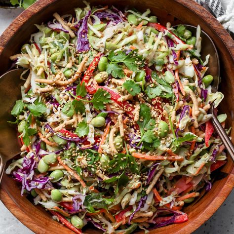 20 minute Chopped Asian Salad with Orange-Sesame Dressing Side Salad With Salmon, Lettuce Soup, Dishing Out Health, Asian Chopped Salad, Asian Inspired Salad, Vegetable Salads, Edamame Salad, Asian Cucumber Salad, Yummy Salads