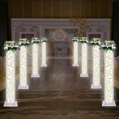 This carved hollow-out flower columns are specially designed with high-quality PVC expansion sheet panels. Auspicious clouds pattern on the outside signifying good luck and happiness. LED lights inside the columns can perfectly illuminate the party space and add a sense of ambiance. | Red Barrel Studio® 8Pcs Carved Wedding Column Flower Stands w / LED Lights () Plastic / Acrylic in White, Size 47.2 H x 7.8 D in | Wayfair Flower Columns, Pillar Decorations, Plant Pedestal, Wedding Columns, Wedding Pillars, Decorative Columns, Cloud Pattern, Roman Columns, Shower Columns