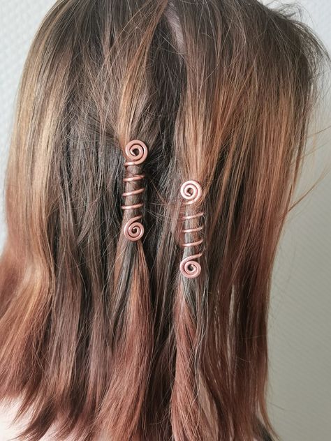 Copper hair spiral, wire coils, hair accessories, jewelry, a pair of spiral copper, hair beads, hair twister, spiral hair wrap, gift for girls Set of two hammered copper hair spirals. A pair of hair spirals handmade of copper. Really easy to apply in the hair and stays in for a long time. Each pair is made separately. It is hand polish to gloss. The spiral on this hair accessory represents the ancient symbol of a grass snake. The snake symbolizes health, vitality and wisdom. The Pin's lenght is Hair Coils Jewelry, How To Make Hair Spirals, Hair Wire Accessories, Copper Hair Accessories, Hair Spirals Accessories, Diy Hair Spirals, Wire Hair Wrap, Hair Spirals, Grass Snake