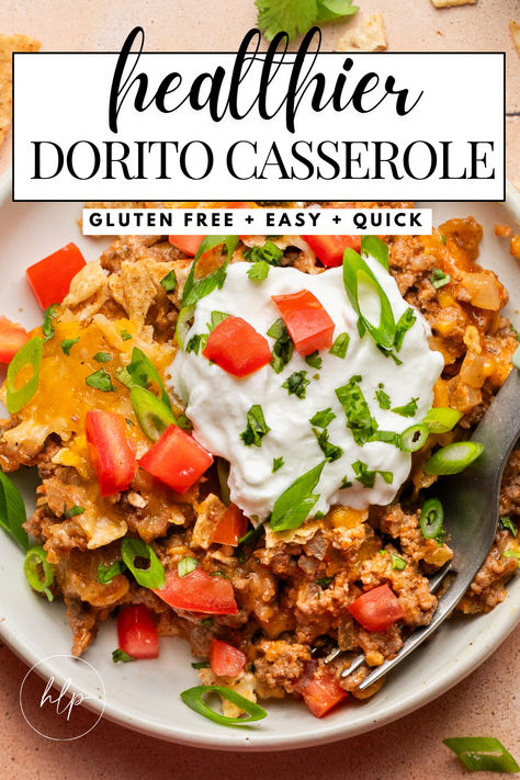 A close up photo of my healthier dorito casserole in a bowl topped with greek yogurt, tomatoes, cilantro and green onions Siete Recipes, Easy Dorito Casserole, Ground Turkey Nachos, Taco Spices, Doritos Casserole, Recipe With Ground Beef, Dorito Casserole, Clean Meals, Yummy Casserole Recipes