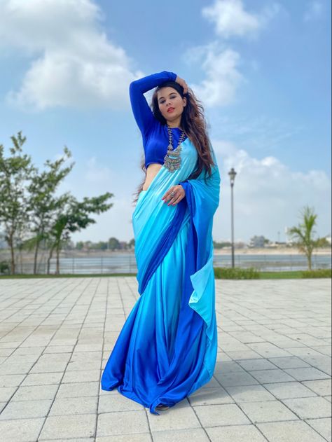 Ombre shaded satin saree in gradiant blue shades. We customise shaded satin sarees to your choice of shades. #TheMuseGirlie #saree #sareeblouse #sareeblousedesigns #satinsaree #sareestyles #satin #satinsilk #satinpajamas #sareedesigns #cocktailsaree #farewellsaree #bridesmaidsaree #bridesmaids #bridesmaiddresses2019 #sari #sariblouse #designersaree #designersareesdelhi #designersareesusa #ombreshadedsaree #shadedsaree Ombre Saree, Satin Sarees, Bridesmaid Saree, Long Gown Design, Silk Sarees With Price, Satin Saree, Fashion Design Dress, Blue Saree, Party Wear Indian Dresses