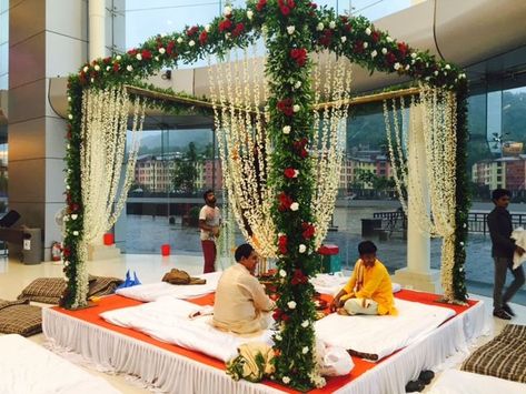 Photo of Green Floral Mandap with White and Red Roses Green Mandap, Hindu Wedding Decorations, Indian Wedding Decorations Receptions, Mandap Design, Wedding Hall Decorations, Wedding Background Decoration, Wedding Entrance Decor, Wedding Stage Design, Mandap Decor