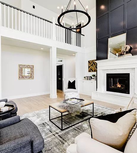 THE NEWPORT HILLSDALE | Custom Home Builder | Clark & Co. Homes | Boise Idaho Black Fireplace White Walls, Fireplace Accent Walls, Fireplace White, High Ceiling Living Room, New House Living Room, Black Fireplace, Addition Ideas, Fireplace Remodel, Home Fireplace