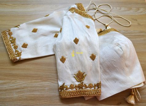 Intricate gold zardosi and beads embroidery on white raw silk blouse #anviti #anvitifashions #anvitiboutique #boutiqueinjayanagar #bridalblouse #bridal #southindianblousedesigns #goldembroidery White Blouse Gold Work, White Raw Silk Blouse, White Blouse Designs, South Indian Blouse Designs, Raw Silk Blouse, Beads Embroidery, Wedding Blouse Designs, Hand Work Blouse, Gold Blouse