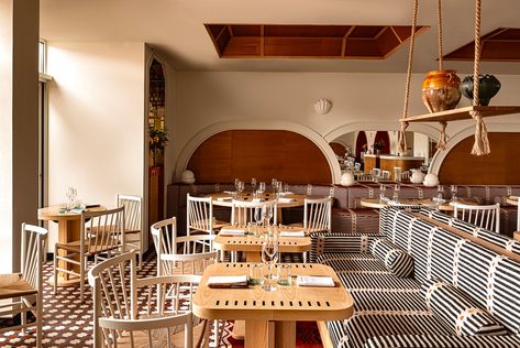 Frenchie Biarritz - Restaurants in Biarritz - Guide du Pays Basque Beach Airbnb, Geometric Headboard, Bahamas Beach, Ingo Maurer, Modernist Architects, Striped Upholstery, Curved Wood, Green Sofa, Nautical Design