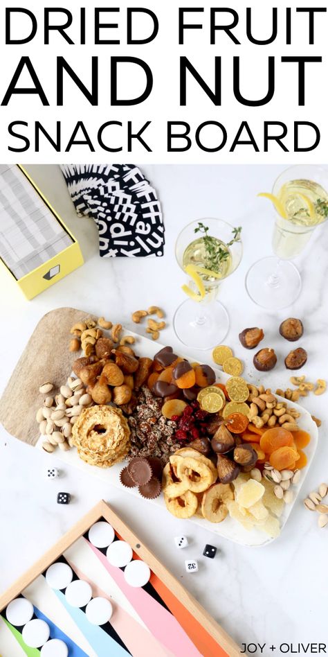 New Years Eve Dried Fruit and Snack Board made of a variety of sweet, salty, spicy and chocolate pairs perfectly with a game night in to end the year. This board makes the perfect appetizer for any holiday or gathering! #appetizer #cheeseboard #nuts #driedfruit Nut Tray Ideas, Nut Board Ideas, Chocolate Pairings, Appetizer Trays, Nut Snacks, New Year's Eve Recipes, Easy Appetizers, Snack Board, Charcuterie Recipes