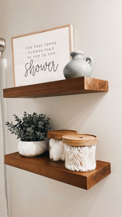 #bathroomdecor #walldecor #floatingshelves #woodshelves #homedecor #bathdecor Apartment Decorating Wood Theme, Bathroom Organization Vanity, Two Shelf Bathroom Decor, Guest Bath Ideas Decor, Cozy Clean Bathroom Ideas, Hanging Shelf Bathroom, Neutral Tone Bathroom Ideas, Guest Bath Shelf Decor, Ways To Decorate Your Bathroom