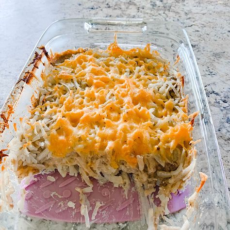 Cowboy casserole is a fun twist on tater tot casserole. It's creamy filling has smokey bacon, shredded hash browns, and ground beef. Cowboy Casserole Recipe, Cowboy Casserole, Pillsbury Crescent, Shredded Hash Browns, Lipton Onion Soup Mix, Taco Bake, Beef Casserole Recipes, Easy Cream, Crescent Roll