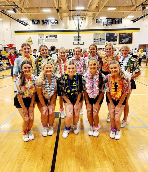 Cheerleaders dressed hawaiian Hawaiian Cheer Theme, Hawaiian Outfits Spirit Week, Hawaiian Football Theme Outfit, Beach Day Spirit Week Outfit, Hawaiian Day Spirit Week, Hawaiian Day, Cheers Theme, Cheer Games, Dance Fits