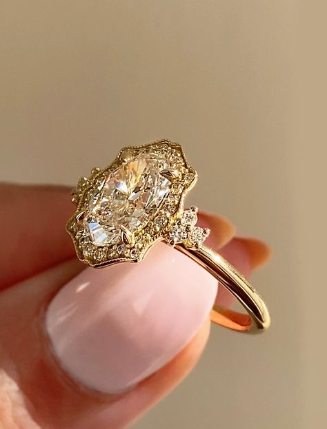 Evelina: Vintage Inspired Halo Cluster Engagement Ring | Ken & Dana Design Antique Gold Oval Engagement Ring, Wedding Rings From The 1980's, Vintage Style Round Engagement Rings, Vintage Inspired Rings Gold, Gem Engagement Rings Gold, Vintage Victorian Ring, Oval Cluster Halo Engagement Ring, Diamond Ring With Colored Side Stones, Alternate Gem Engagement Ring