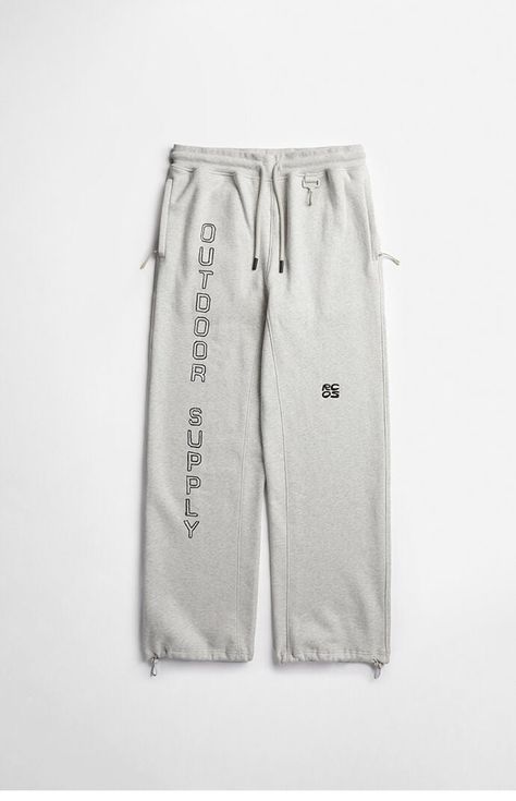 Upgrade your lounge game with the functional and comfortable Logo Sweatpants from RC Outdoor Supply. Featuring RCOS logo graphic down the left leg, these sweatpants come with zipper side hand pockets, elastic ankle cuffs, and an adjustable drawstring waistband for a custom fit.Solid color sweatpantsSoft fleece lining12" rise32.5" inseam20" leg openingDrawstring waistbandZipper side hand pocketsBack patch pocketElastic ankle cuffsRCOS graphics and embroiderySoft-touch coated metal signature hook Branded soft-touch toggle at leg openingTicked drawcord and pullers100% cottonHand washMeasurements taken from a size medium RC Outdoor Supply Mens Logo Sweatpants - Grey size XS Mens Fits, Logo Sweatpants, Sweatpants Grey, Ankle Cuffs, Mens Joggers, Men Winter, Drawstring Waistband, Mens Sweatpants, Logo Graphic