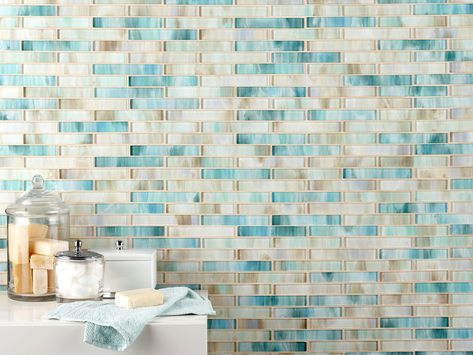 Liven up any room with this linear 12 x 12 Azula Linear Glass Mosaic in blue. The long lines of a linear shaped glass decorative can make a small room seem bigger. Decorative accents can be used to enhance kitchens, bathrooms, and other areas of your home. A stunning glass or stone backsplash adds unique detail to any design. The wide range of shapes and colors found in our glass presents a great way to express creativity. This product can be installed on a shower wall. | Montage | Azula Linear Beachy Backsplash, Beach Kitchen Ideas, Beach Crafts Diy, Tile Spacers, Stone Backsplash, Floor And Decor, Marble Mosaic, Glass Mosaic Tiles, Tile Installation