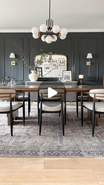 Krystal Smit on Instagram: "The making of a moody dining room 🖤 Comment SHOP and I’ll send you the links to this space!

Paint color is Iron Ore by SW! I have a Dining Room highlight saved with more details on how we did the moulding! Finished with modern and vintage inspired styling – which always has my heart.

WAYS TO SHOP:

1. Tap the blue link in my IG profile @thesmittencollective
2. Head to my LTK to shop my home
3. Go to my AMAZON STOREFRONT for Amazon pieces
4. Go to www.thesmittencollective.com to Browse My Home
.
.
.
.
.
.
.
#diningroom #moodydiningroom #darkpaint #diningroominspo #diningroomdecor #diningroomdesign #ltkhome #amazonhome" Swanky Dining Room, Moody Dining Room Paint Colors, Iron Ore Dining Room, Dark Dining Rooms, Moody Dining Room Ideas, Moody Dining Room, Dark Dining Room, Dining Room Paint Colors, New Home Wishes