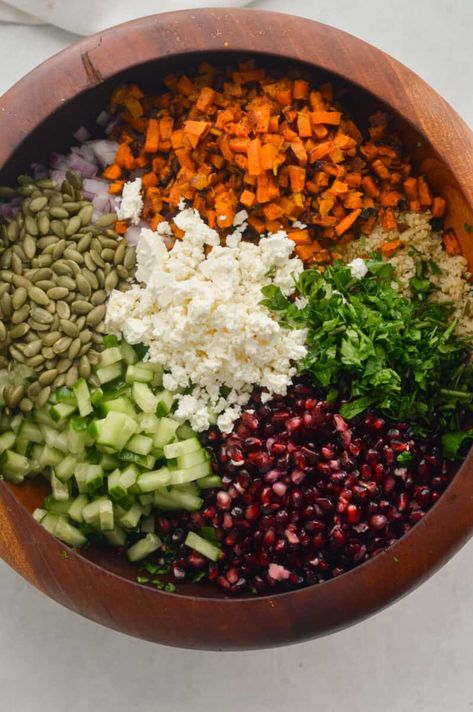 Crunchy kale winter salad with pomegranates, cucumber, pumpkin seeds, feta, parsley, sweet potato, and quinoa. Crunchy Kale Salad, Pomegranate Kale Salad, Sweet Potato And Quinoa, Pumpkin Seed Salad, Sweet Potato Quinoa Salad, Crunchy Kale, Sweet Potato Salad Recipe, Salad With Pomegranate, Seed Salad