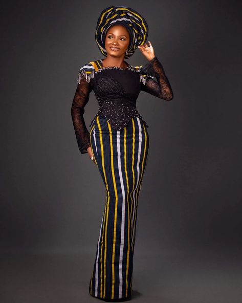 Fashion of the Week - Tag Designers #ankaragridFOTW African Women Traditional Outfits, Modern Yoruba Fashion, Black Gown Styles, Smoky Gowns Ankara, Women Agbada Gown, Aso Oke Dress Styles, Ready To Wear Ankara Styles, Ready To Wear Styles In Nigeria, Red Dresses For Kids