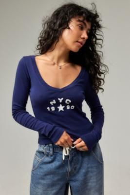 Be a 90s baby in this NYC applique tee by BDG. Cut to a smaller shrunken fit in soft, stretchy cotton with a plunging neckline and long sleeves. Only at Urban Outfitters. **About Better Cotton** \- By choosing our cotton products, you’re supporting our investment in Better Cotton’s mission \- This product is sourced via a system of mass balance and therefore may not contain Better Cotton \- Bettercotton. org/massbalance **Content + Care** \- 100% Cotton \- Machine wash **Size + Fit** \- Model is 171cm/5'7.5" and wearing size Small \- Use our size guide to check how this product fits | BDG NYC 1990 Long-Sleeved T-Shirt - Navy M at Urban Outfitters Applique Tee, 90s Baby, Birthday Board, Plunging Neckline, Shirt Top, Lifestyle Brands, T Shirt Top, Shirt Shop, Size Guide