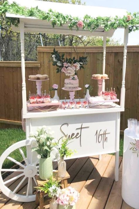 Feast your eyes on this beautiful floral sweet 16! The dessert table cart is fab!! See more party ideas and share yours at CatchMyParty.com #catchmyparty #partyideas #sweet16 #sweetsixteen #floralparty #girlbirthdayparty Sweet 16 In Backyard, Sweet 16 Yard Decorations, Sweet 16 Party Centerpieces, Rustic Sweet 16 Party Ideas Decoration, Sweet 16 Outdoor Decorations, Sweet 16 Neutral Theme, Whimsical Sweet 16 Party Ideas, Sweet 16 Decorations Outdoor, Sweet Sixteen Dessert Table Ideas