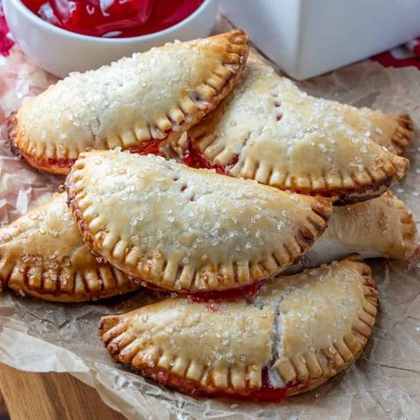 So you’ve got the main dish and the sides covered but what about dessert? These sweet summer desserts that will be the hit of your next picnic or cookout! Cherry Hand Pies Recipes, Fruit Hand Pies, Cherry Hand Pies, Pecan Sticky Buns, Hand Pie Recipes, Kinds Of Pie, Fried Pies, Hand Pie, Canned Cherries