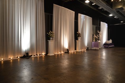 Outer walls highlighted with illuminated draping panels around the room. Watch as we go from white for the ceremony and change color for the reception. ~Draping by Events Plus Nashville. #Wedding #reception #draping #Venue #transformation #decorations #lighting Banquet Hall Wedding Decor Draping, White Curtains Wedding Draping, White Draped Walls Wedding, Chiffon Wall Draping, Wedding Wall Drapery Ideas, Wall Drapping Ideas, Drape Walls For Party, Draping Walls For Wedding, How To Decorate Wedding Venue Walls