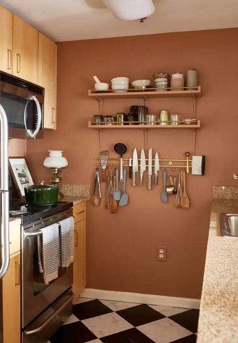 This Decorating Trend Can Dress Up Your Kitchen Instantly | Apartment Therapy White Kitchen Cabinets Terra Cotta Floor, Fun Kitchen Wall Colors, Same Color Walls And Cabinets, Rust Color Kitchen Walls, Apricot Kitchen Walls, Terracotta Paint Color Kitchen, Terra Cotta Kitchen Decor, Terra Cotta Colored Walls, Terracotta Kitchen Walls Paint Colors